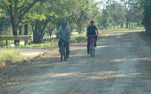 Cycling on dirt road Cycling on dirt road