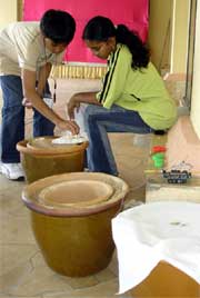 Examining pots Examining pots